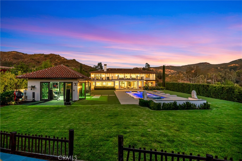 2037 Delphine Lane Calabasas, CA 91302 - Photo 56 of 75 a view of green field with house in the background