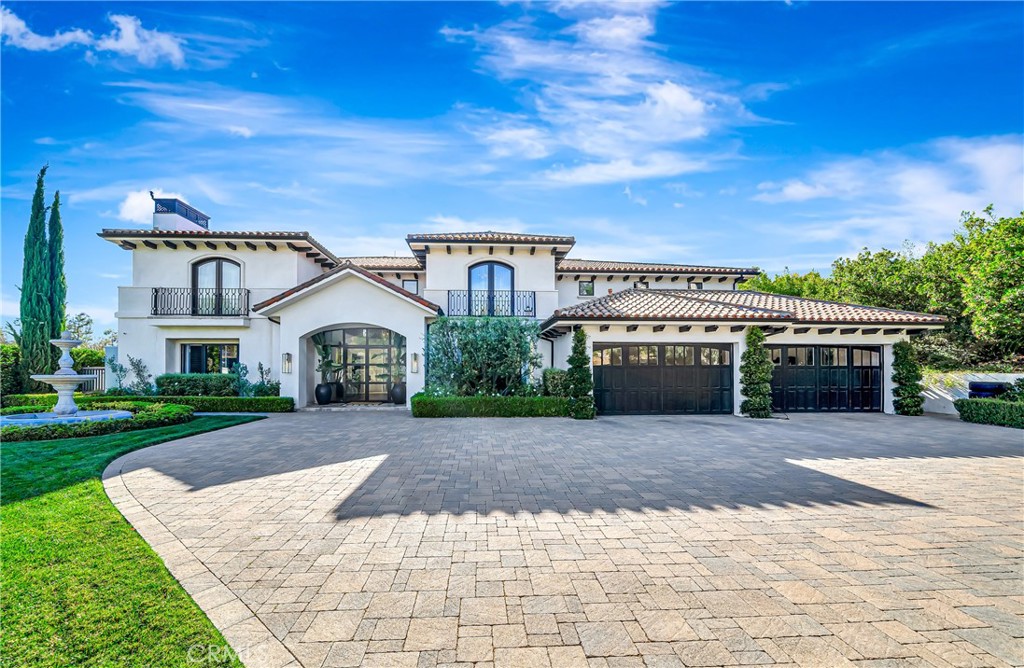 2037 Delphine Lane Calabasas, CA 91302 - Photo 75 of 75 a front view of a house with a yard