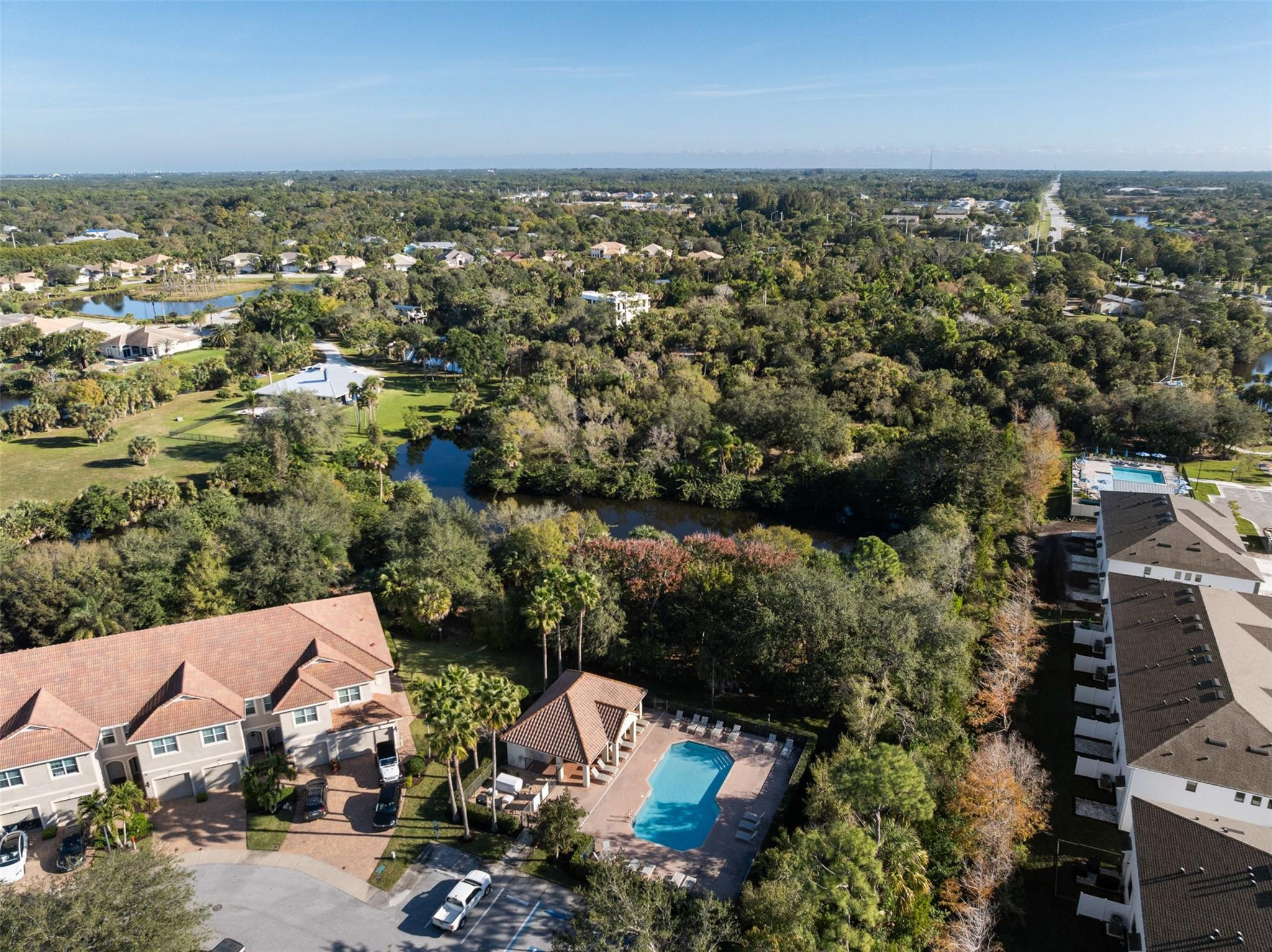 651 Southwest Glen Crest Way, Unit 2 Stuart, FL 34997 - Photo 37 of 41 an aerial view of a house with a yard