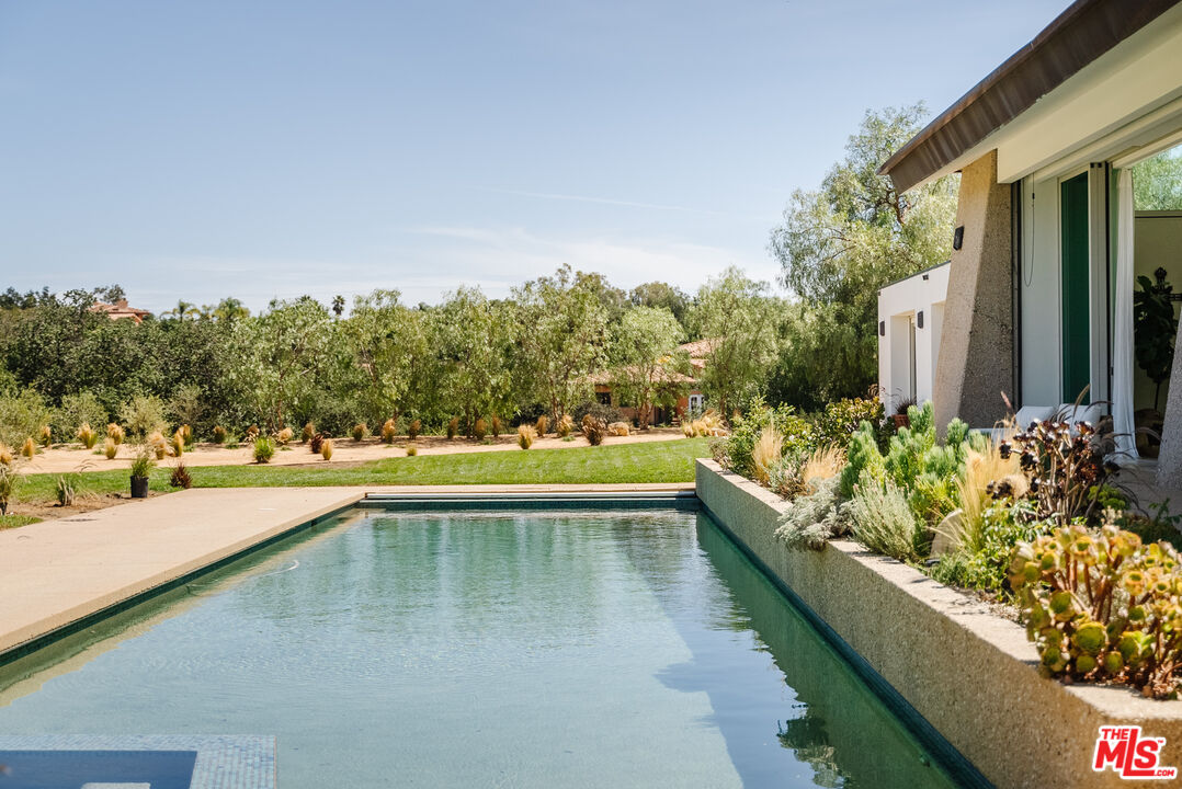1750 Will Geer Road Topanga, CA 90290 - Photo 14 of 49 a view of a swimming pool with a patio