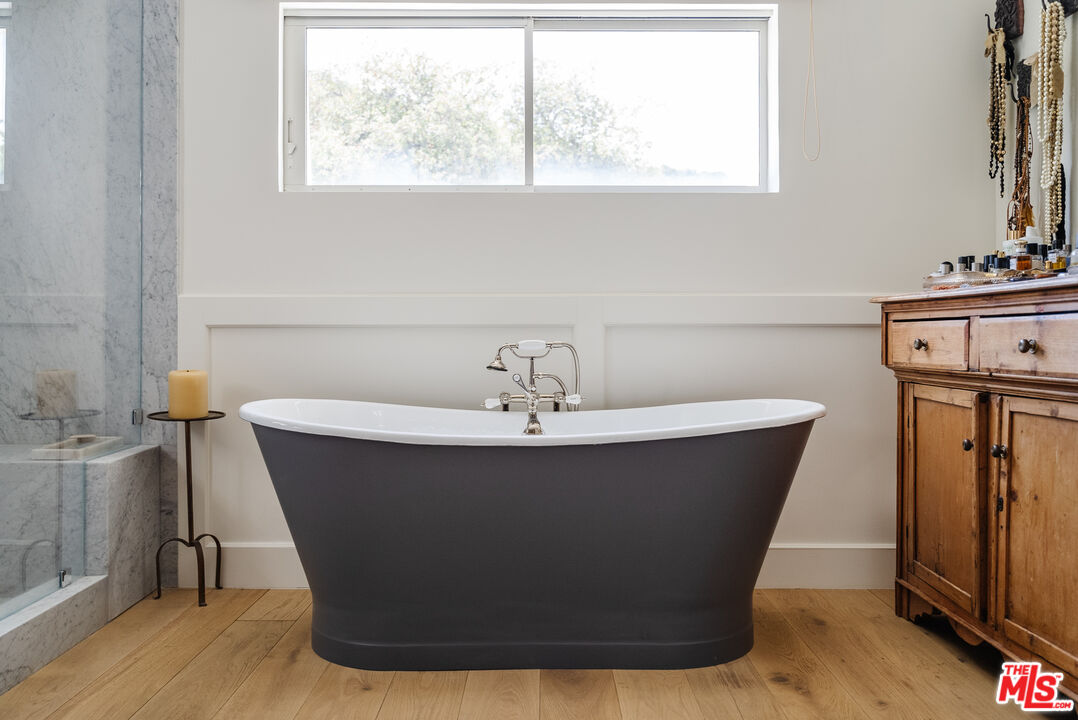 1750 Will Geer Road Topanga, CA 90290 - Photo 32 of 49 a white bath tub sitting in a bathroom