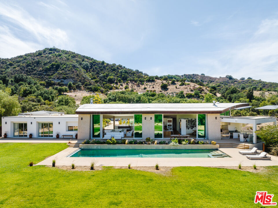 1750 Will Geer Road Topanga, CA 90290 - Photo 42 of 49 a view of house with swimming pool and yard