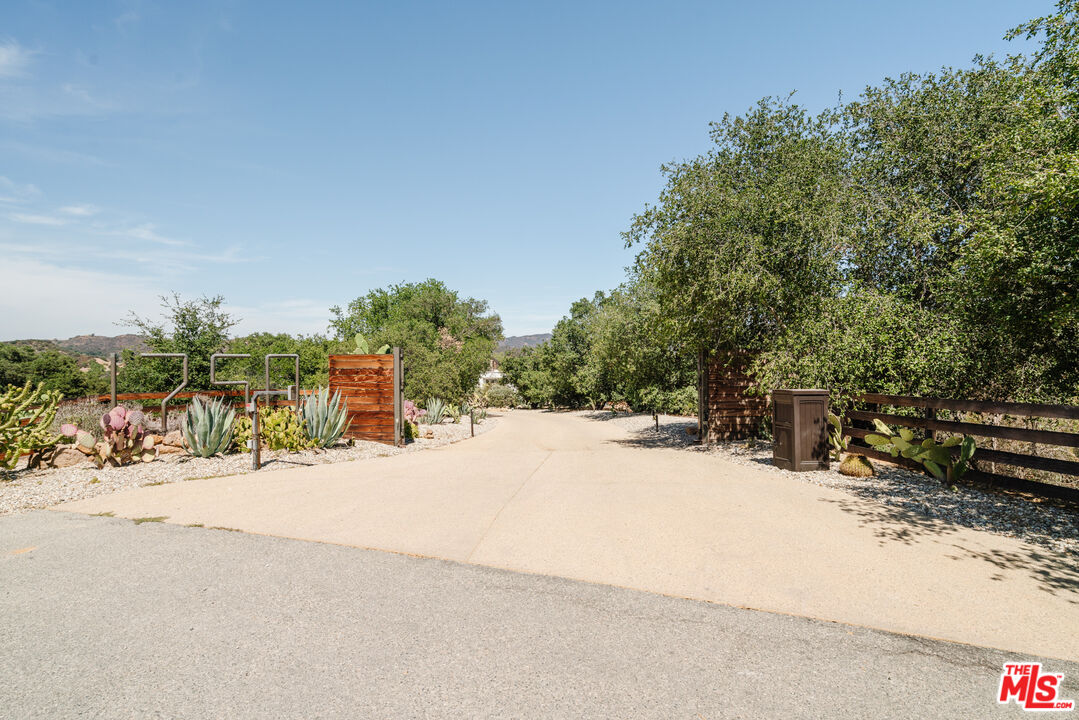 1750 Will Geer Road Topanga, CA 90290 - Photo 47 of 49 a view of a road with a building in the background
