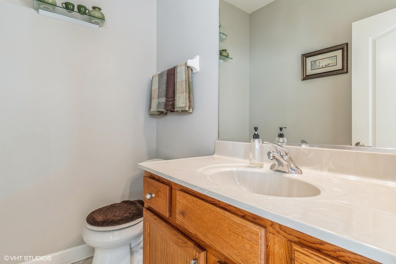 11976 Winterberry Lane Plainfield, IL 60585 - Photo 11 of 22 a bathroom with a sink and a toilet