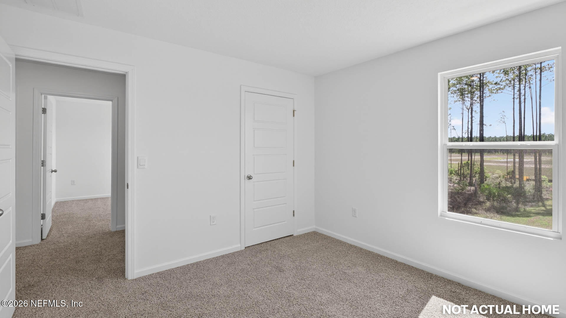 12095 Yew Tree Road Jacksonville, FL 32218 - Photo 22 of 61 a view of an empty room with a window