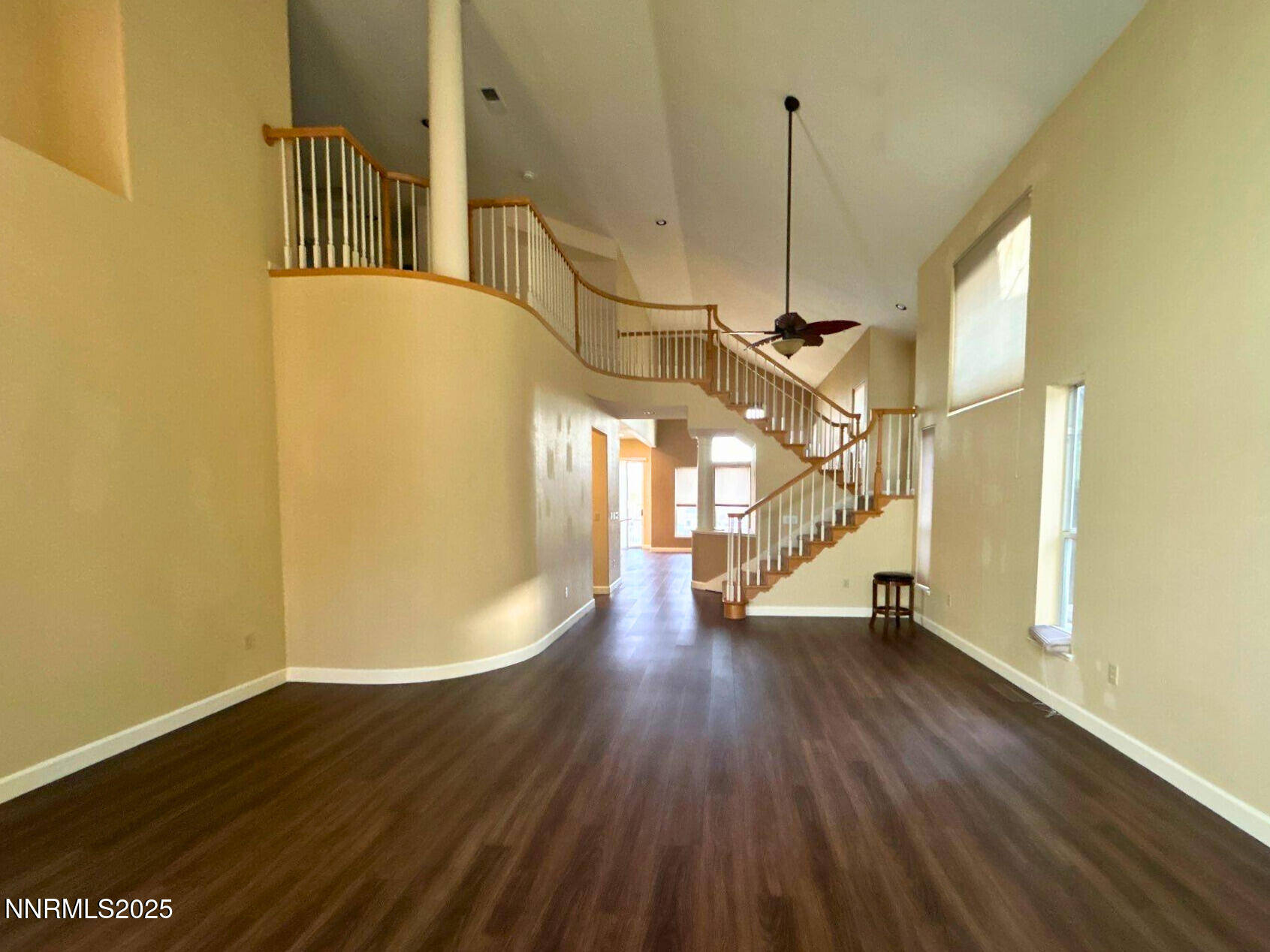6190 Carriage House Way Reno, NV 89519 - Photo 2 of 26 a view of a room with wooden floor