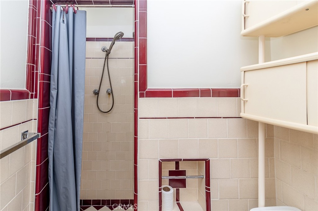 630 Acoma Street Needles, CA 92363 - Photo 25 of 60 a bathroom with a shower and a sink