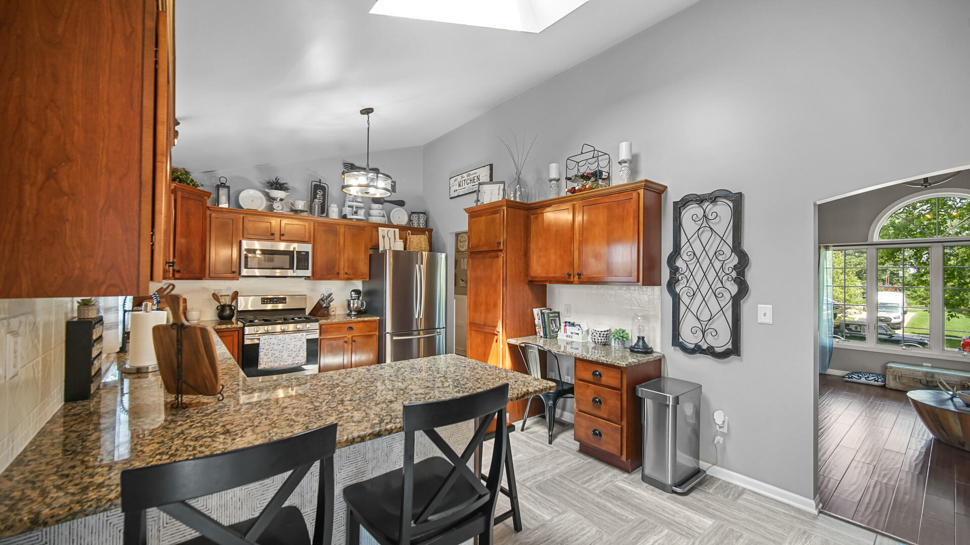 7313 West 91st Place Crown Point, IN 46307 - Photo 9 of 28 a view of a dining room with furniture and chandelier