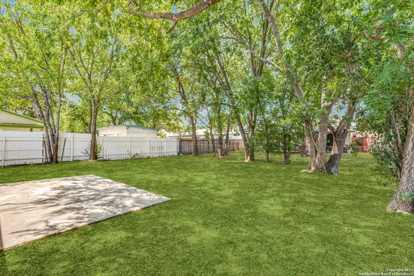 a view of a backyard with a garden