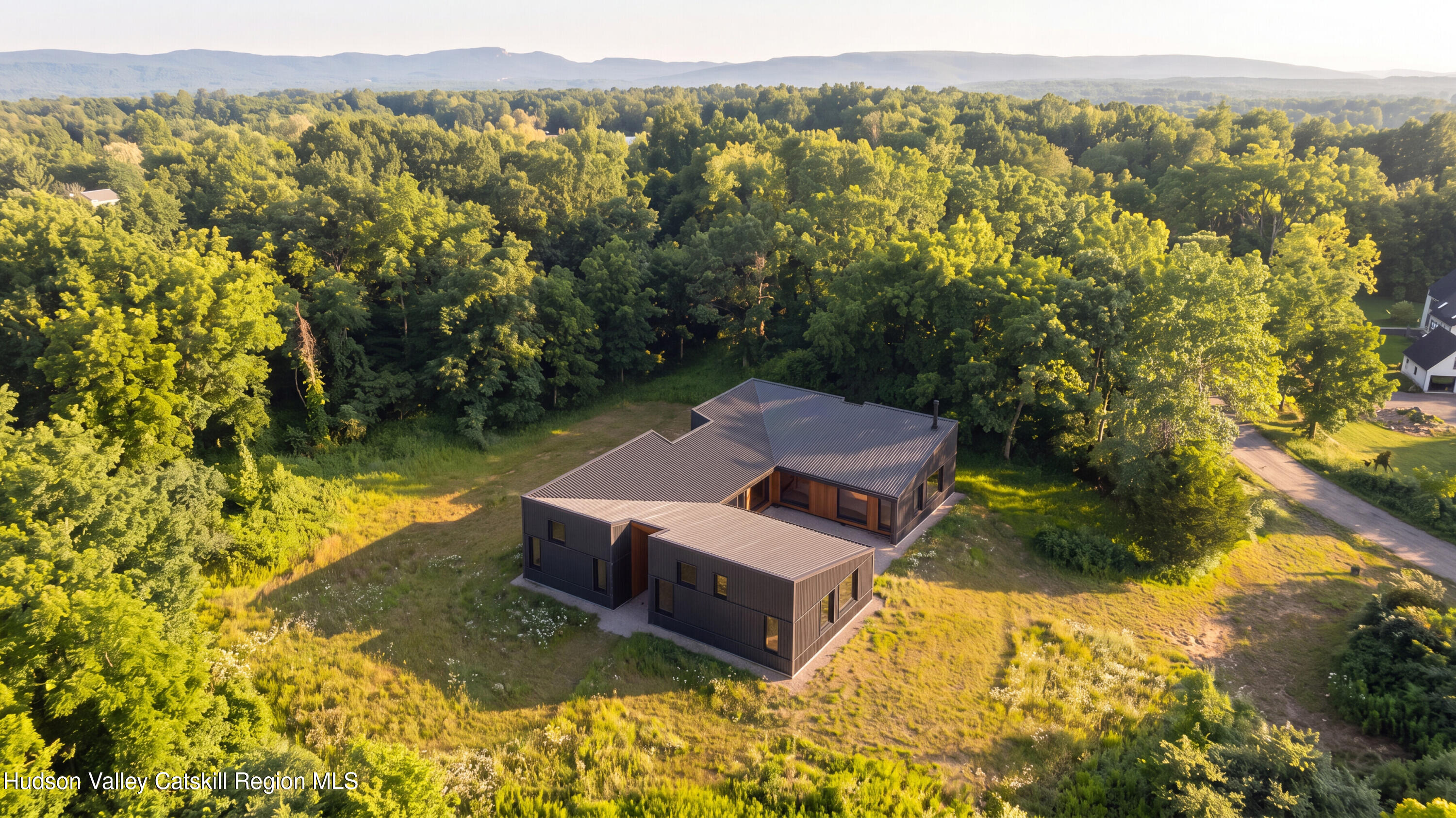 6 Van Derburgh Cl Stone Ridge, NY 12484 - Photo 6 of 17 a view of a lake with a mountain