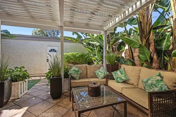 a view of a house with a potted plant
