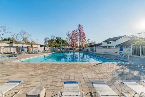 a view of a swimming pool with an outdoor space