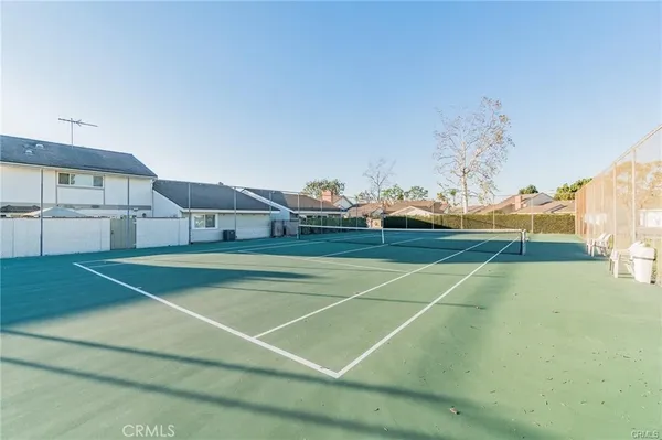 a view of an outdoor space and tennis court