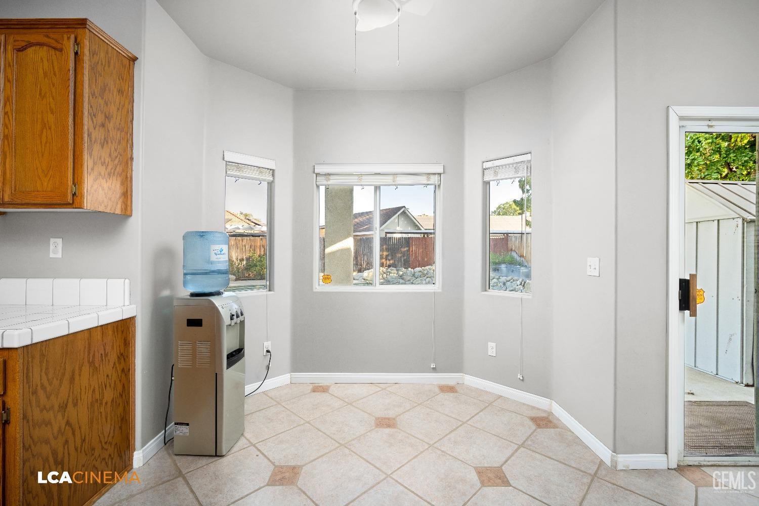 Undisclosed Address Bakersfield, CA 93312 - Photo 11 of 21 a view of hallway with window and wooden floor