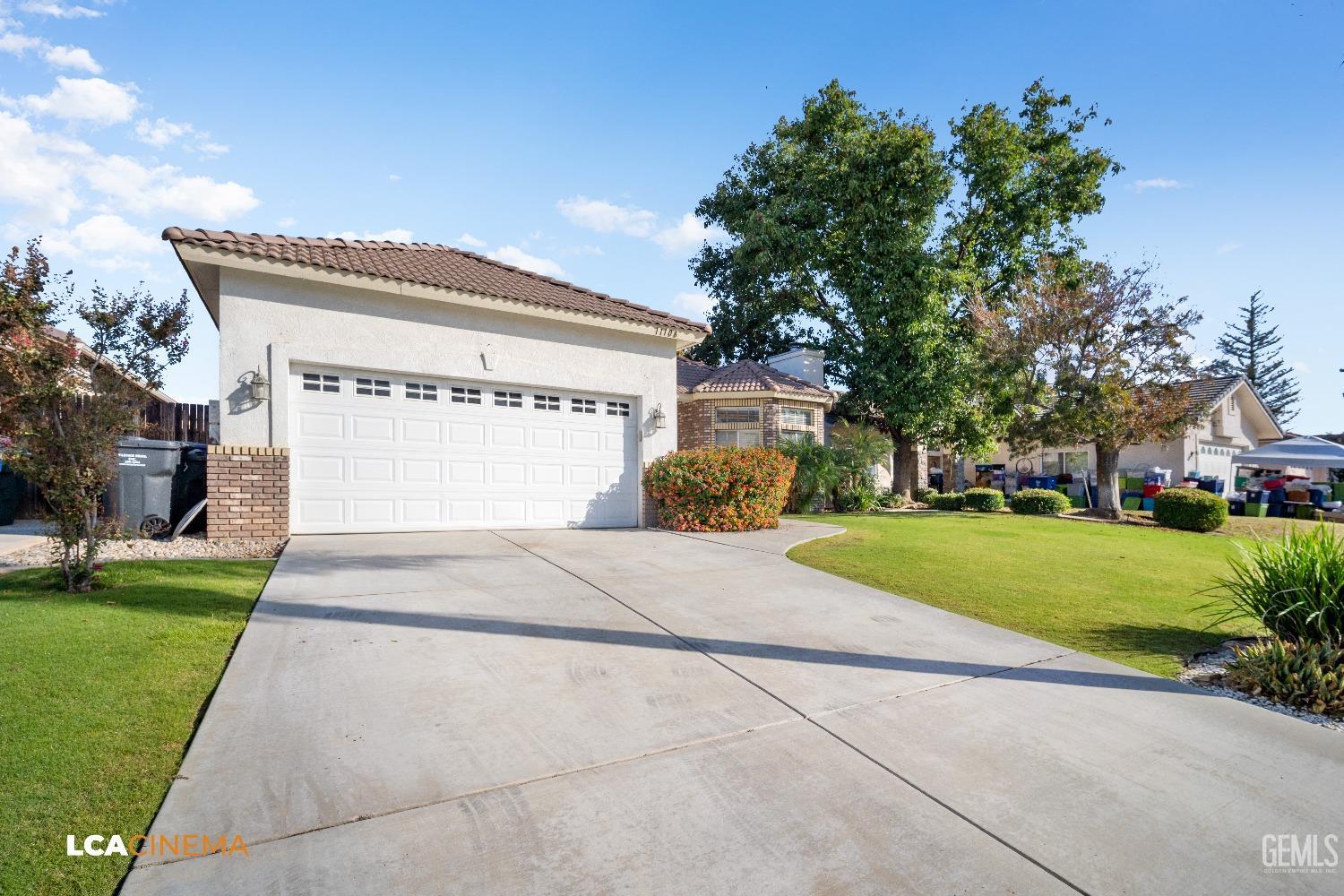 Undisclosed Address Bakersfield, CA 93312 - Photo 4 of 21 a sign on the side of a building