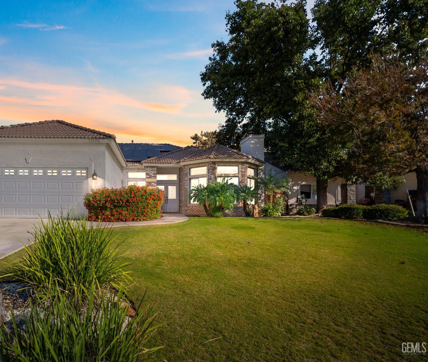 Undisclosed Address Bakersfield, CA 93312 - Photo 6 of 21 a view of a big yard with plants and large trees