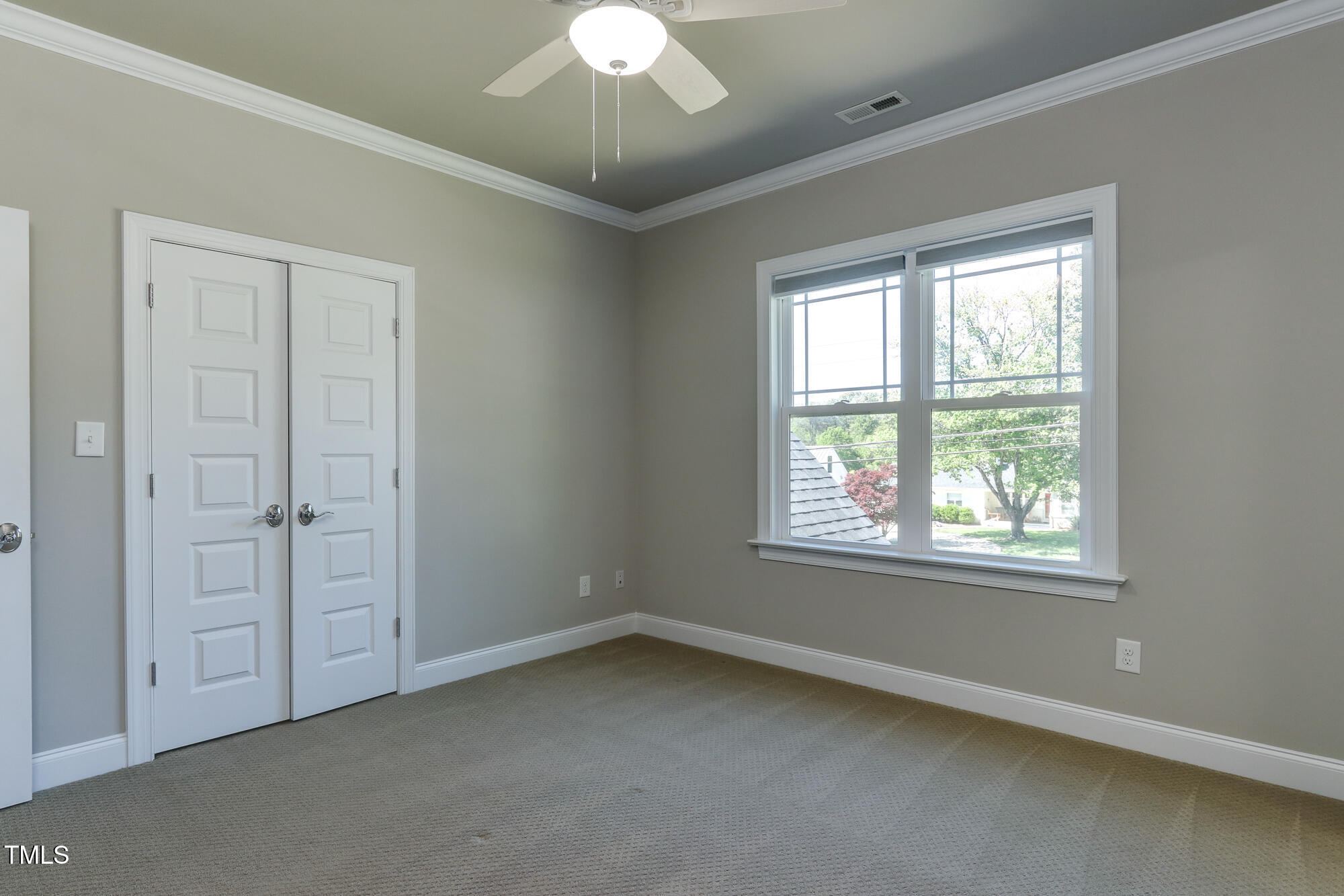 721 Shelley Road Raleigh, NC 27609 - Photo 34 of 46 a view of an empty room with a window