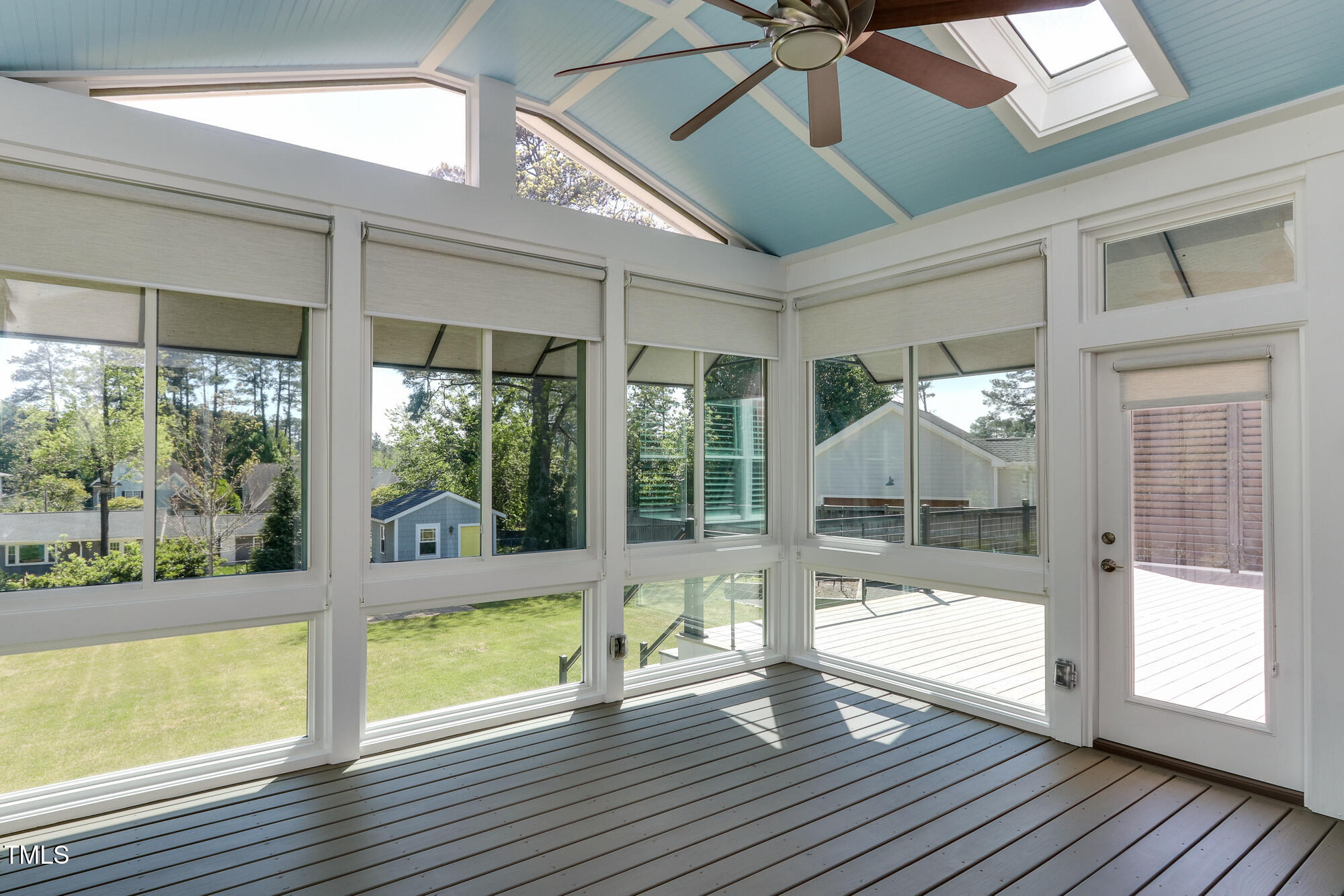 721 Shelley Road Raleigh, NC 27609 - Photo 35 of 46 a view of an empty room with wooden floor and a window