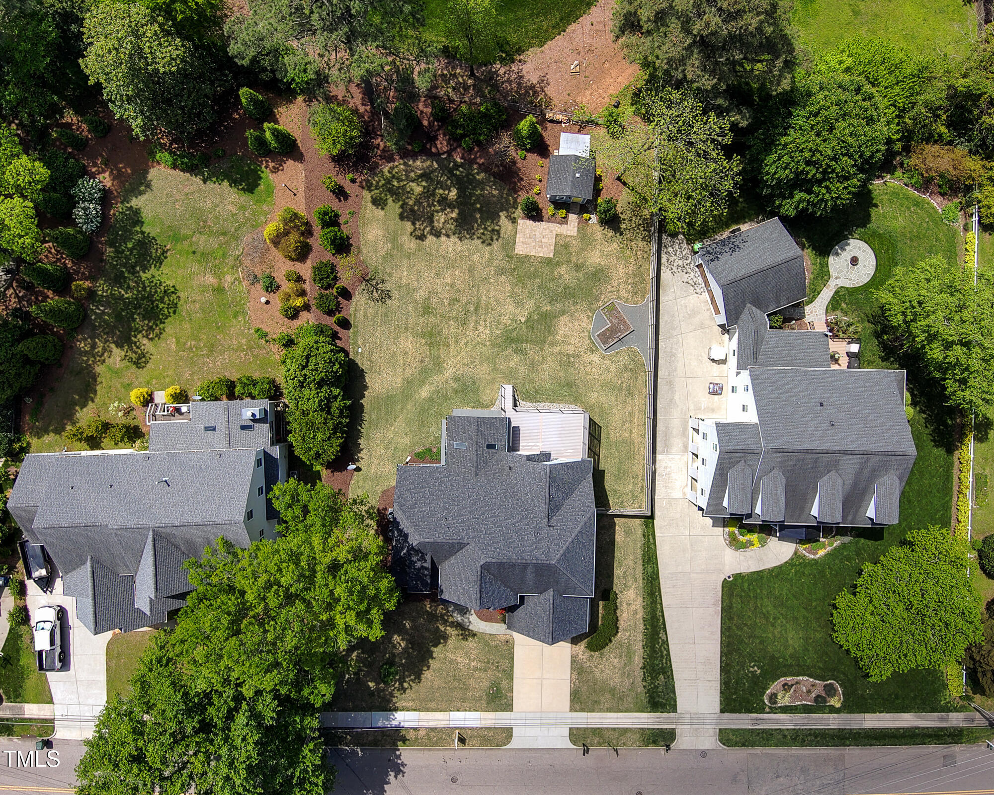 721 Shelley Road Raleigh, NC 27609 - Photo 45 of 46 an aerial view of multiple houses with yard