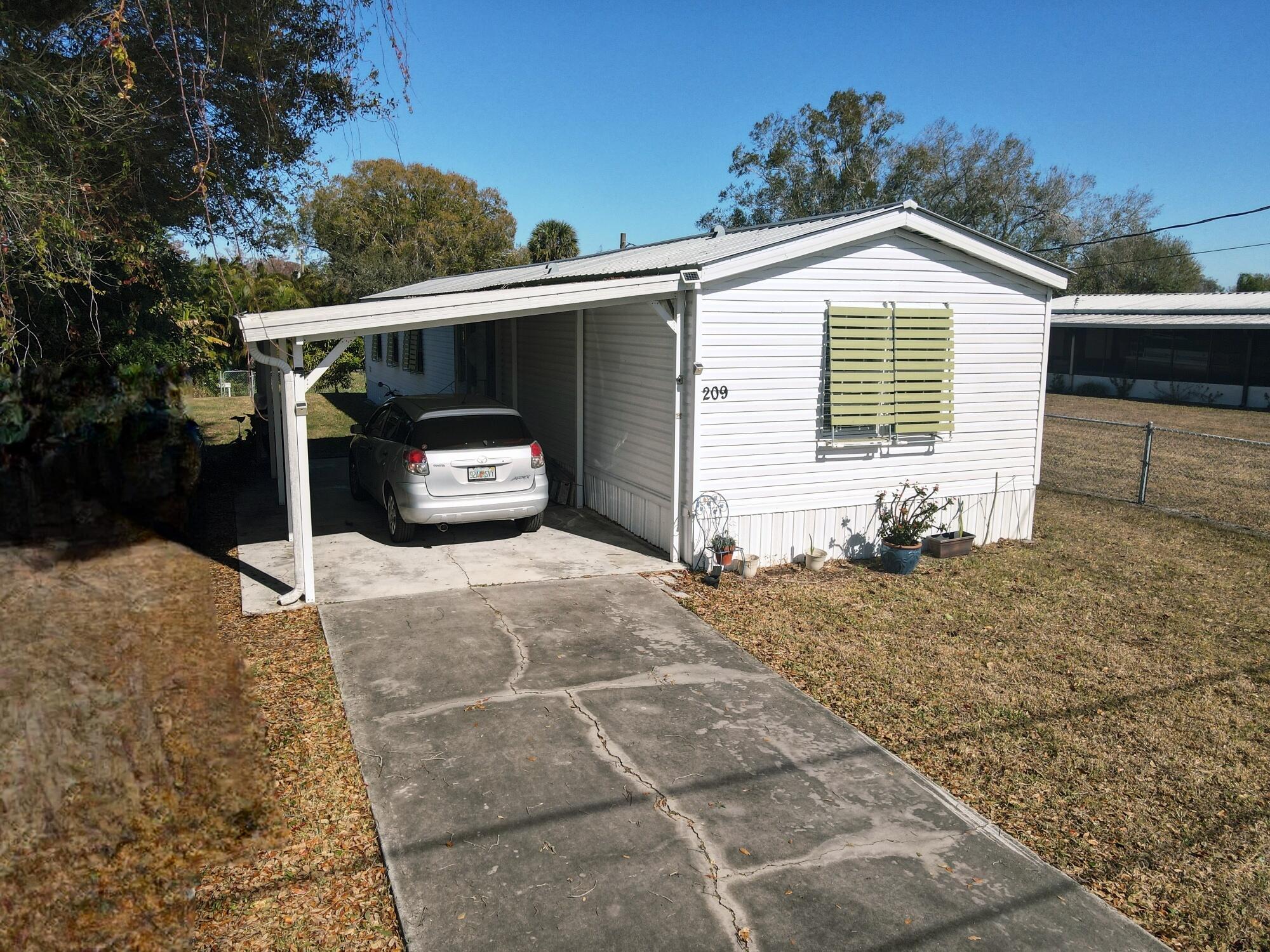 209 Southeast 8th Street Okeechobee, FL 34974 - Photo 11 of 35 dji_fly_20260119_112900_910_176892210642