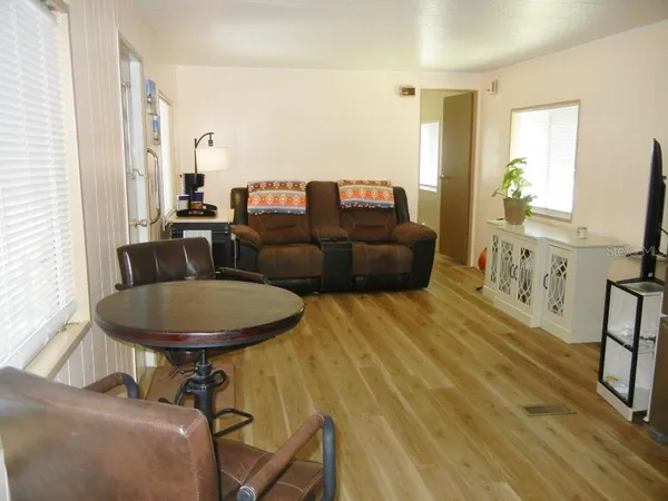 a living room with a couch and a table