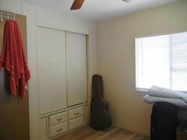 a view of a closet with storage