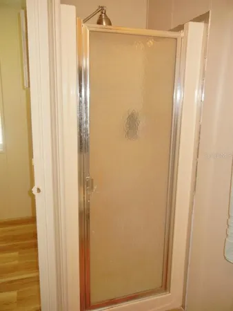 a bathroom with a glass door