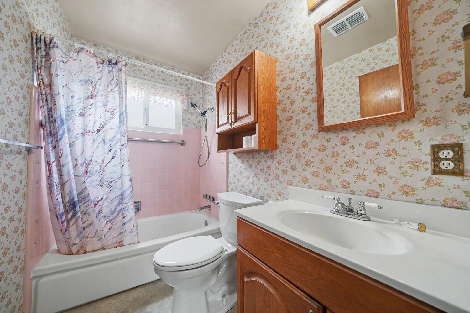 626 Sutter Lane Ione, CA 95640 - Photo 11 of 21 a bathroom with a sink toilet and shower