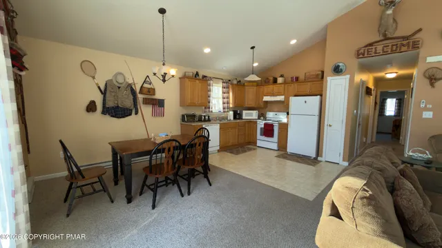 a view of a dining room with furniture
