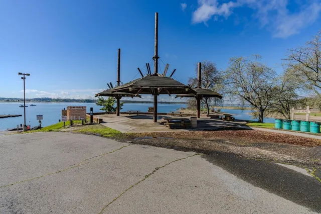 a view of a lake and a swimming pool
