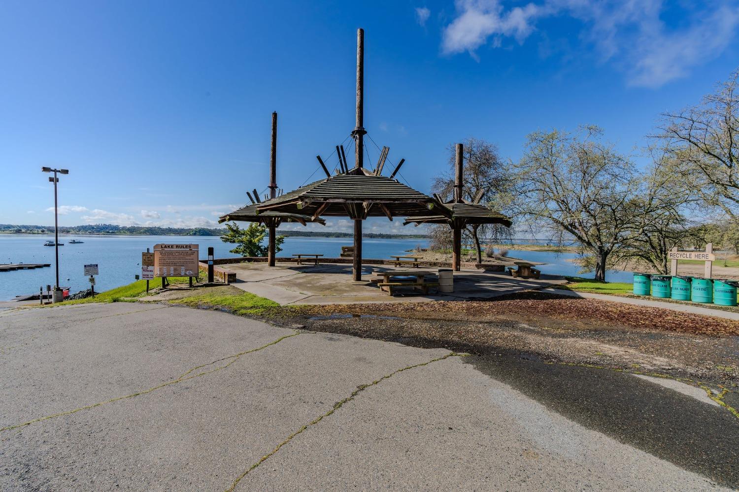 2000 Camanche Road, Unit 16 Ione, CA 95640 - Photo 30 of 36 a swimming pool with outdoor seating and yard
