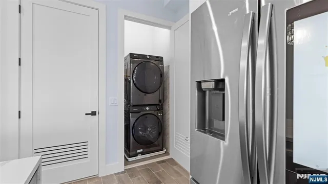 a view of storage and utility room with washer and dryer