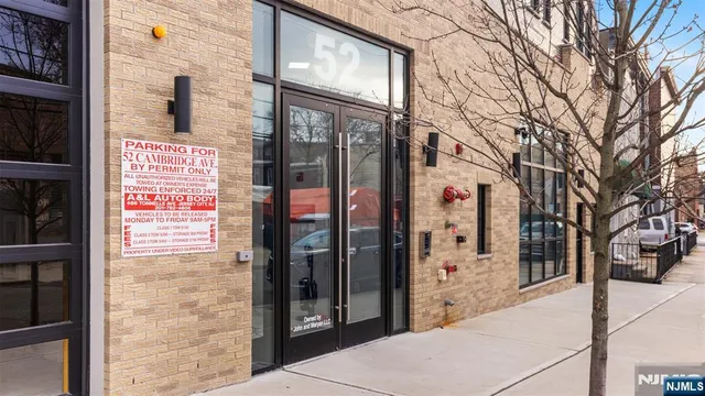 a sign board on the side of a street