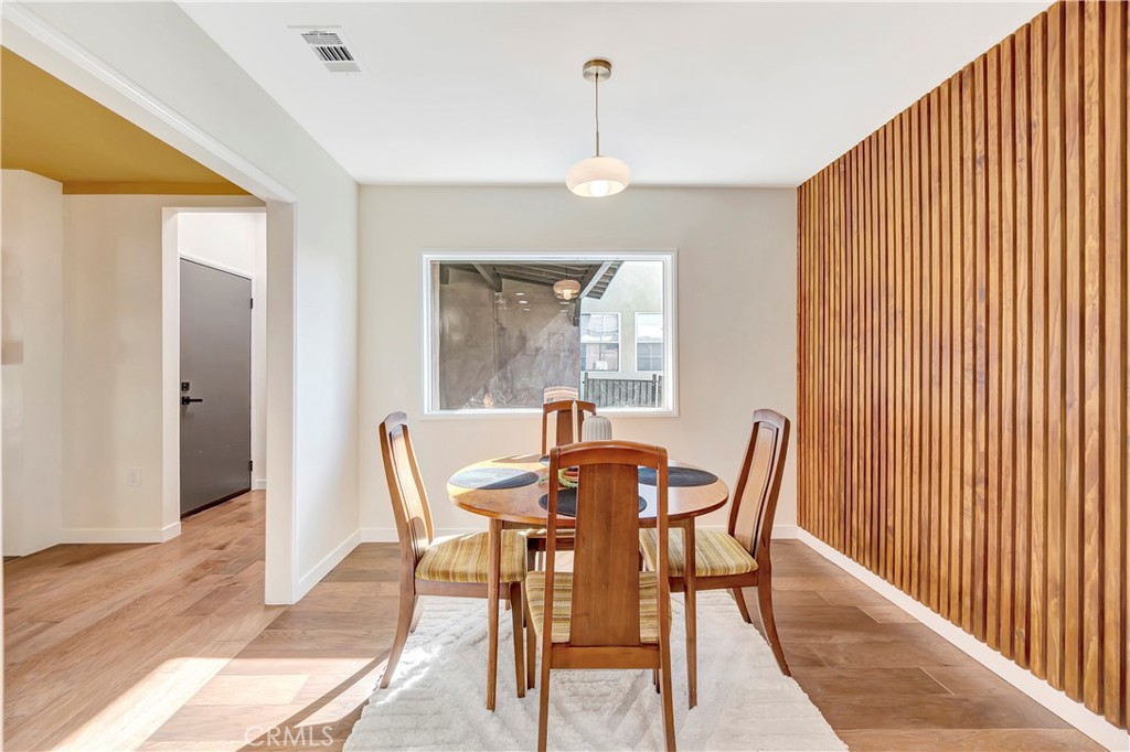 68 Laurel Drive Altadena, CA 91001 - Photo 12 of 59 a view of a dining room with furniture window and wooden floor