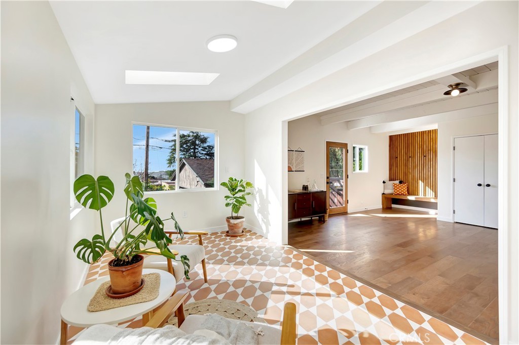 68 Laurel Drive Altadena, CA 91001 - Photo 24 of 59 a view of a hallway with a potted plant