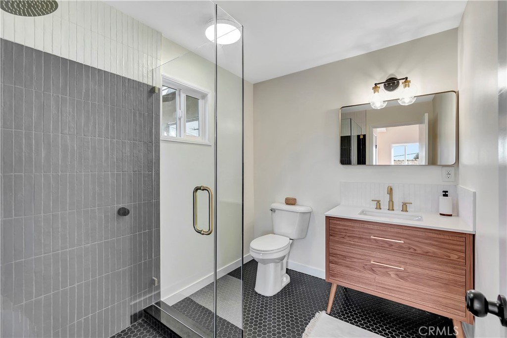 68 Laurel Drive Altadena, CA 91001 - Photo 27 of 59 a bathroom with a toilet sink and shower