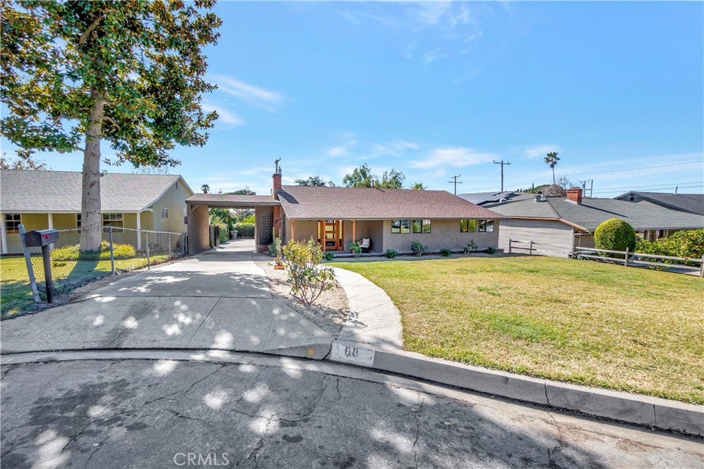 68 Laurel Drive Altadena, CA 91001 - Photo 3 of 59 a front view of a house with swimming pool