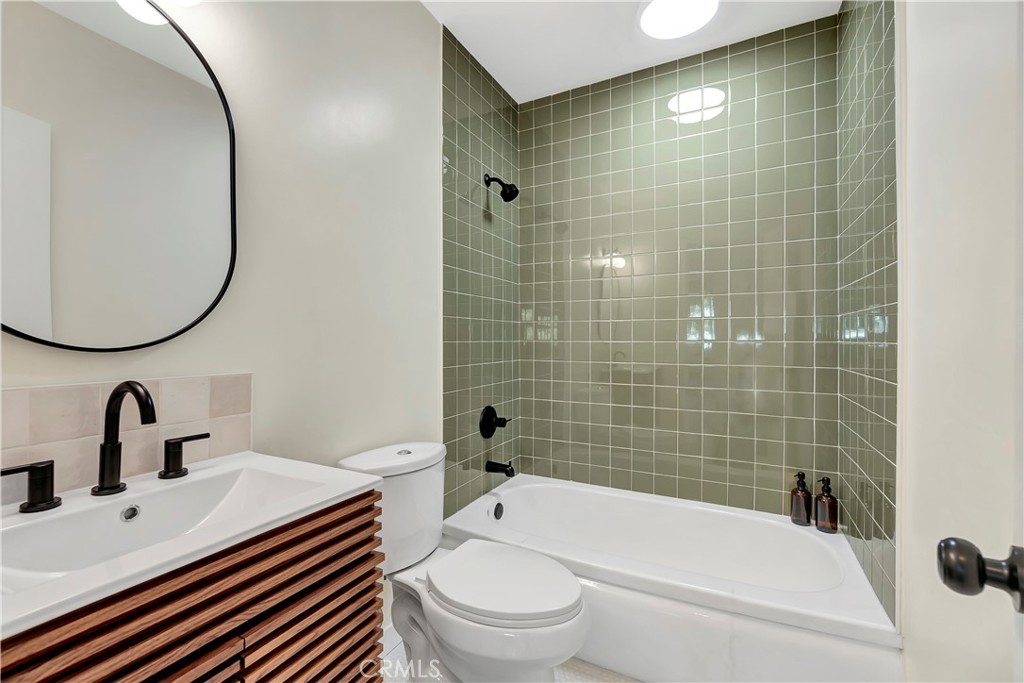 68 Laurel Drive Altadena, CA 91001 - Photo 37 of 59 a bathroom with a sink a toilet and shower