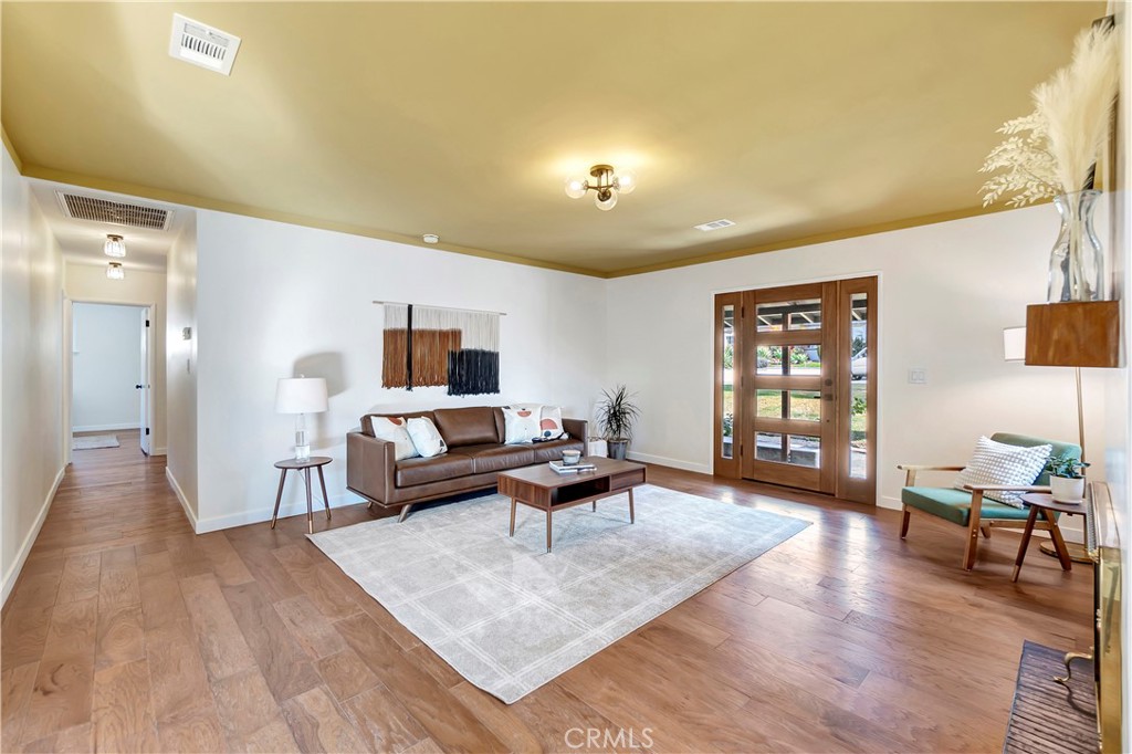 68 Laurel Drive Altadena, CA 91001 - Photo 7 of 59 a living room with furniture and wooden floor