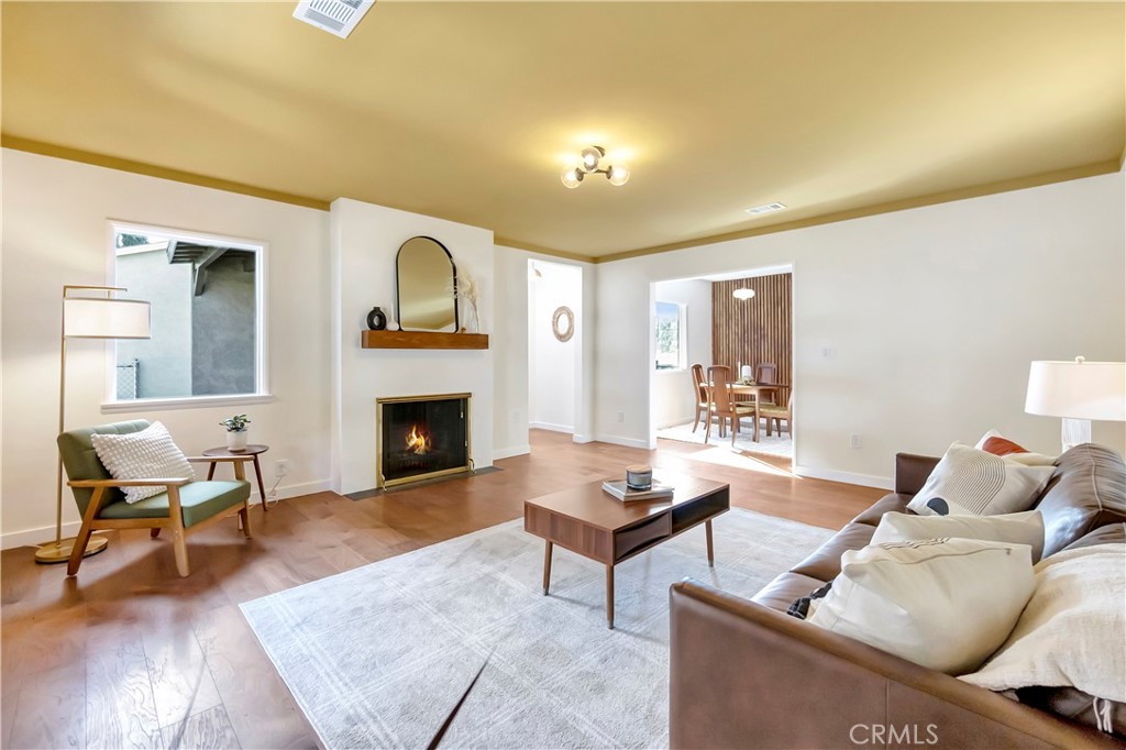 68 Laurel Drive Altadena, CA 91001 - Photo 9 of 59 a living room with furniture and a fireplace