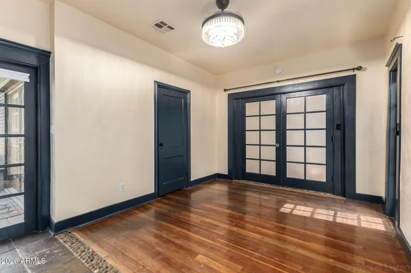 an empty room with windows