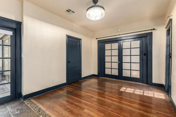 an empty room with windows