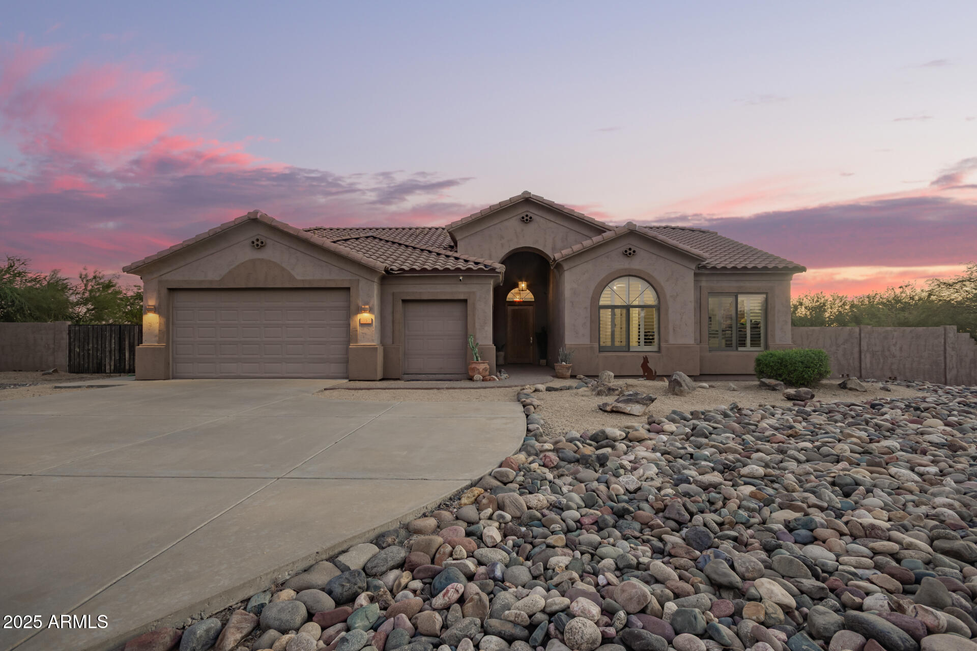 105 East Tanya Road Phoenix, AZ 85086 - Photo 1 of 63 a front view of a house with a garden
