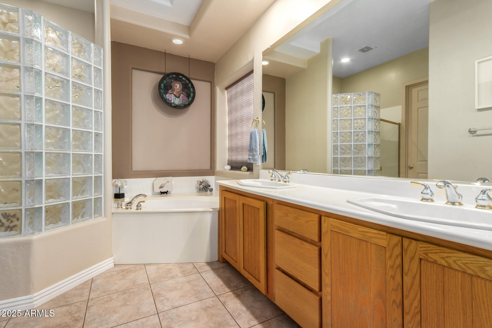 105 East Tanya Road Phoenix, AZ 85086 - Photo 35 of 63 a spacious bathroom with a double vanity sink mirror and bathtub