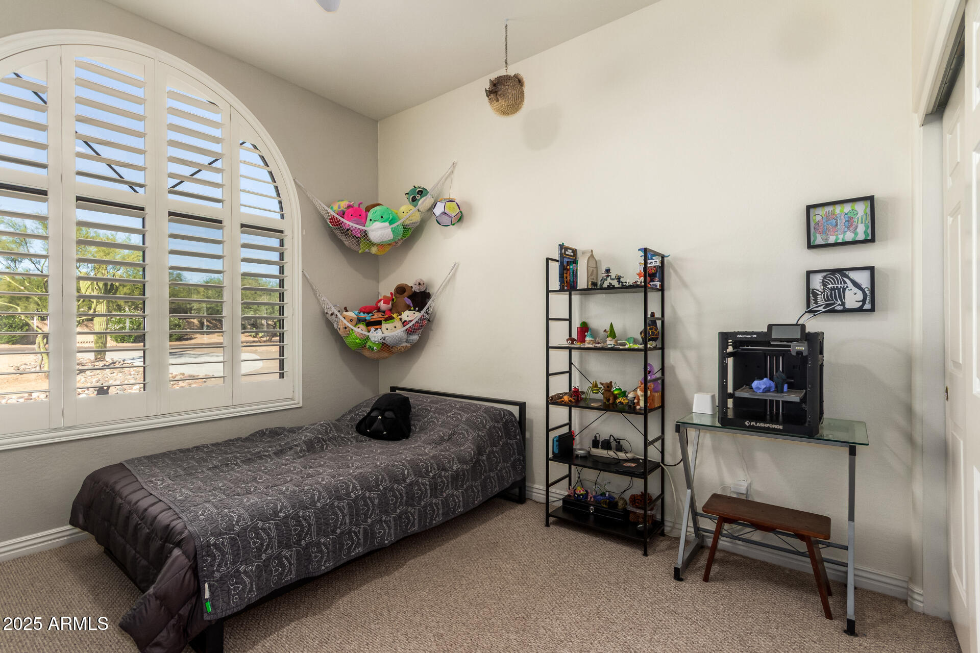 105 East Tanya Road Phoenix, AZ 85086 - Photo 40 of 63 a bedroom with a bed and a window