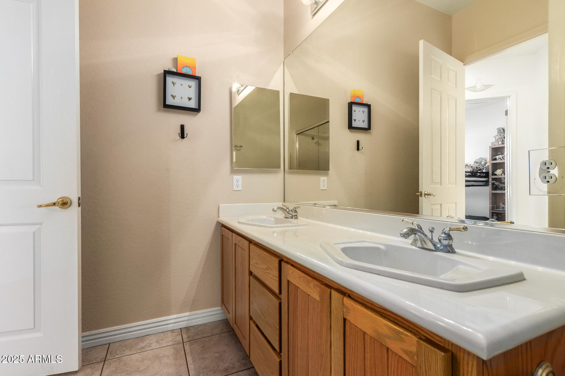 105 East Tanya Road Phoenix, AZ 85086 - Photo 41 of 63 a bathroom with a sink and a mirror
