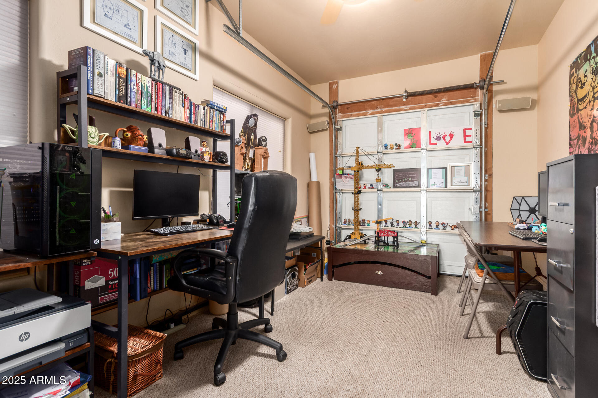 105 East Tanya Road Phoenix, AZ 85086 - Photo 43 of 63 a view of a workspace with furniture and a window