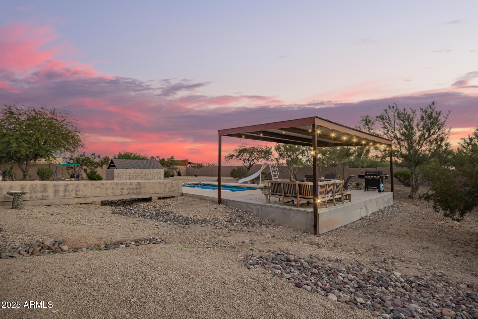 105 East Tanya Road Phoenix, AZ 85086 - Photo 46 of 63 a view of a dry yard with wooden fence
