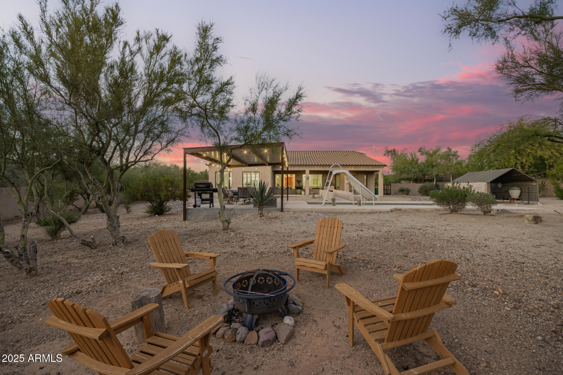 105 East Tanya Road Phoenix, AZ 85086 - Photo 51 of 63 a view of a backyard with sitting area