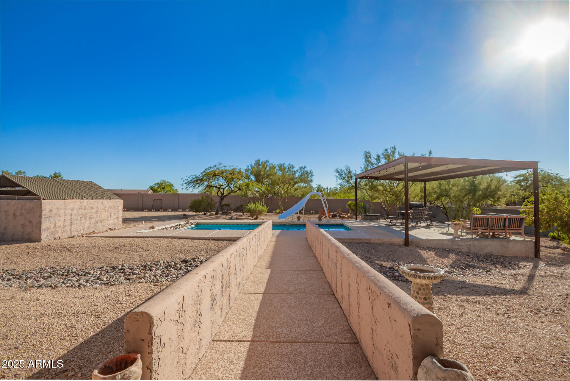 105 East Tanya Road Phoenix, AZ 85086 - Photo 55 of 63 a view of a terrace with sitting area